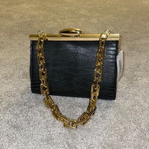 Black and gold purse